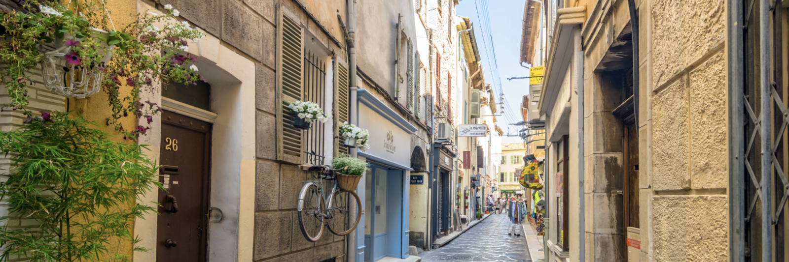 Old Antibes streets with restaurants and cafés nearby
